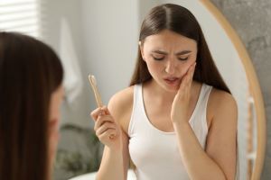 Woman with severe toothache