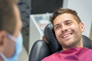 Smiling man at dentist office